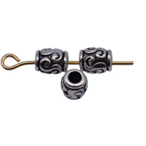 Perles d'espacement en métal argenté antique avec motif S, idéales pour dreadlocks et bijoux.