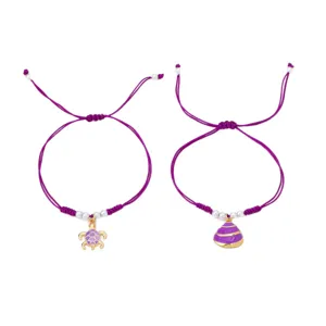 Set di cavigliere intrecciate stile oceano estivo con pendenti a forma di tartaruga e conchiglia.