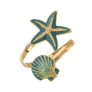 Blauwe emaille metaal zeester en schelp open manchetarmband voor zomer strand mode.