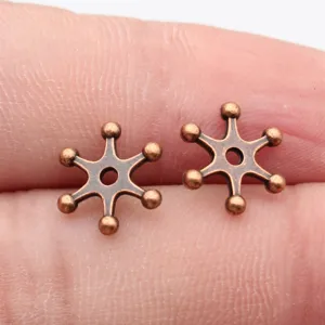 Perline distanziatrici a stella in metallo bronzo per creazione di gioielli fai da te.