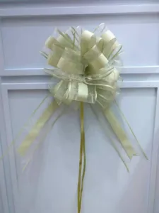 Large decorative wedding car pull bow, metallic matte snow yarn bow for celebration.