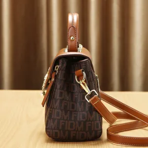 Retro bruine monogram schoudertas met handvat en riem voor dames forenzen stijl