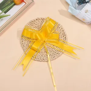 Grand ruban de nœud en organza à tirer pour emballage cadeau de mariage et fête.