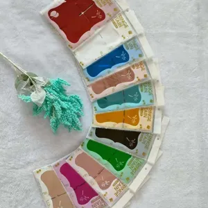 Multi-color foil fringe curtains flat lay main image for party and wedding wall backdrop decor.