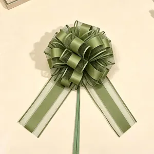 Fiocco tirante in nastro verde per confezioni regalo di Natale e decorazione floreale.