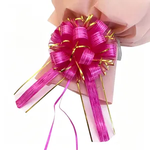 Large pink pull bow for gift wrapping, wedding car decor, and Christmas tree decoration.