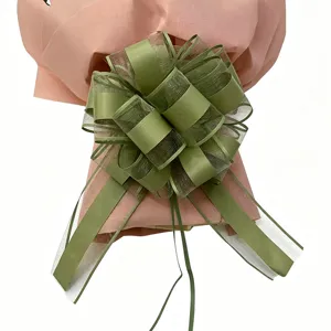 Extra large decorative pull bow for gift wrapping, green ribbon flower, elegant holiday decor.