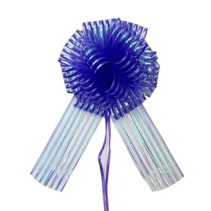 Purple sheer ribbon gift bow detail close-up, perfect for Christmas holiday party decoration.