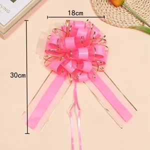 Large pink gold-edged 3d pull bow for gift wrapping, flower bouquet and wedding car decoration.
