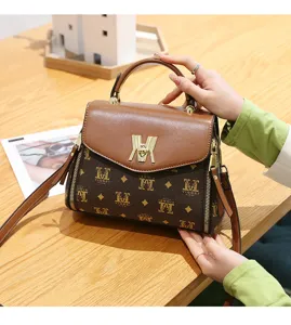 Stylish brown monogram leather women handbag, elegant top handle shoulder crossbody bag.