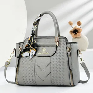 Grey embossed handbag with chic scarf decoration, elegant shoulder bag for daily commuting women.