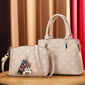 Beige monogram tote and crossbody handbag set, stylish commuter two-piece bag for women.