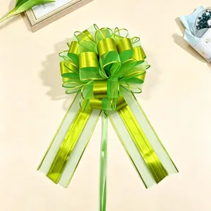 Green gift wrapping pull bow, matte metallic 3D bow for Christmas and party decoration.