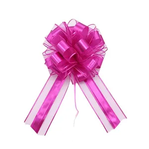 Large 6.4cm metallic pull bow for Christmas gift wrapping and holiday party decoration.