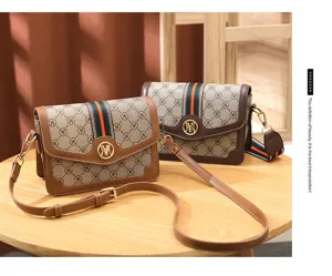 Classic vintage monogram pattern crossbody shoulder bag with stylish stripe and leather trim.