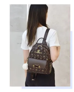 Women brown monogram backpack casual PU leather school travel daypack with cute pom pom.