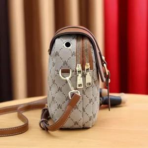 Kleine Umhängetasche für Damen, stilvolle Handytasche aus Canvas und Leder braun.