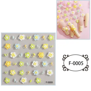 Cute 5D embossed nail art stickers featuring lovely flower designs for manicure decoration.