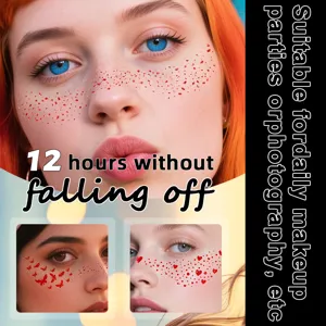 Close-up view of waterproof temporary face tattoo stickers featuring freckles and butterfly designs.