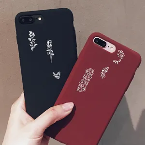 Protective phone case with elegant white embossed floral patterns and butterfly design