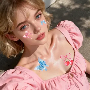 Waterproof temporary tattoo stickers with cute pink bows and cherry designs for sweet makeup.
