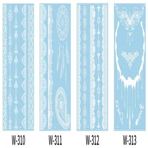 Detailed view of white lace temporary tattoo stickers featuring exquisite patterns for body art.