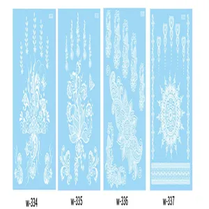 White lace tattoo sticker detail showing intricate floral and mandala patterns for body art.