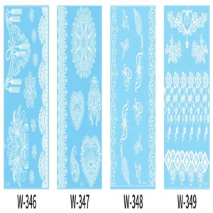 Detailed view of white lace temporary tattoo stickers, waterproof 3D henna body art designs.