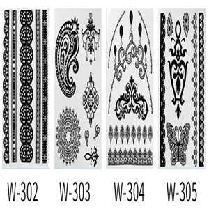 Detailed view of black lace temporary tattoo sheets featuring various elegant floral and geometric patterns.
