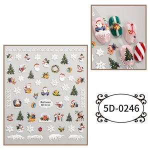 Adesivi per unghie natalizi in rilievo 5D con Babbo Natale fiocchi di neve e alberi.