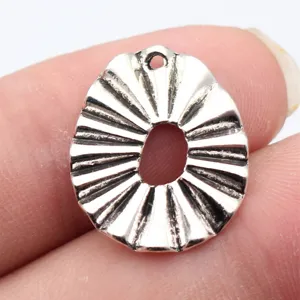 Silver pleated egg geometric pendant detail, hollow metal DIY jewelry making accessory charm.