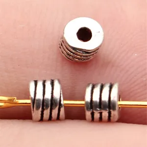 Silver metal threaded round spacer beads for DIY jewelry making, size 4.5x4.3x3.6mm.