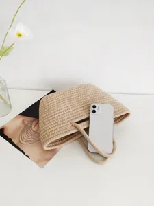 Bolso de mano de paja tejido a mano para niños, lindo bolso casual de estilo pastoral para uso diario.