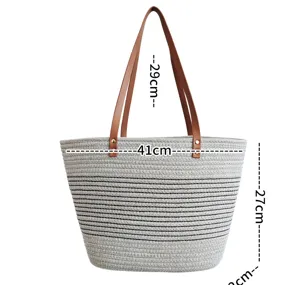 Lässige geflochtene Stroh-Tragetasche für Damen, große Schultertasche mit braunen Griffen.