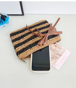 Handgemachte Bast-Clutch Tasche mit Schleife, Retro gestreifte Strohtasche für Handy Aufbewahrung.