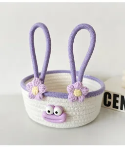 Cute cotton rope storage basket detail, woven desktop organizer with lovely cartoon face and flowers.