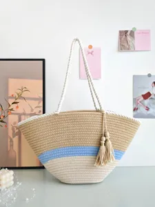 Sommer neue farbblockierende große gewebte Umhängetasche Strandstroh-Tasche für Damen.