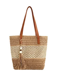 Modische farbblockierende, ausgehöhlte Stroh-Schultertasche, große lässige Strandhandtasche.