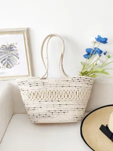 Beige gewebte Baumwoll-Tragetasche, hohle Urlaubs Strand Schulter Handtasche Muster.