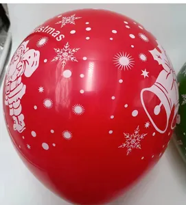 Detailed close-up of a vibrant red latex balloon featuring cute Christmas print. Perfect for decor.