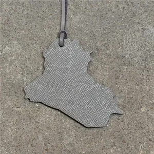 Grey leather Iraq map bag charm, stylish leather strap keychain, unique accessory for purses.