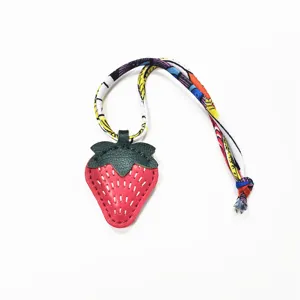 Cute leather strawberry bag charm with colorful printed silk ribbon keychain pendant