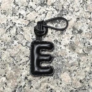 Black leather letter E bag charm, custom initial keychain and stylish car hanging pendant.
