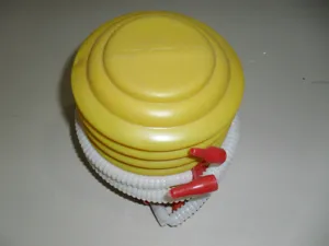 Portable foot air pump with bellows and flexible hose for balloons and inflatables.