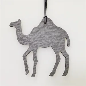 Leather camel bag charm for women, stylish animal handbag pendant accessory for daily use.