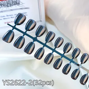 Close-up detail of short round press-on nails with metallic aurora cat eye finish, 32 pcs.