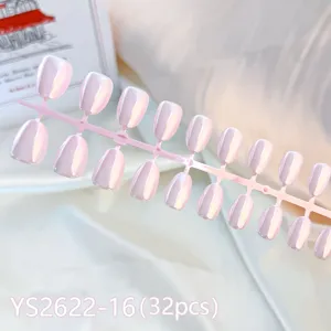Detail shot of short round press-on nails in pink magnetic cat eye finish, 32pcs set.