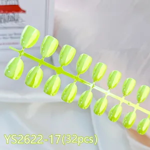 Close-up detail of short round 32pcs aurora cat eye press-on nail set, vibrant color display.