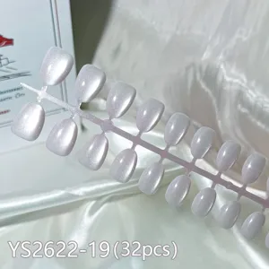 Short round press on nails set with stunning aurora cat eye effect, 32 pieces detail view.