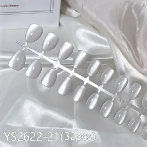 Detailed view of short round cat-eye press-on nails, 32 pcs pack with aurora shine.